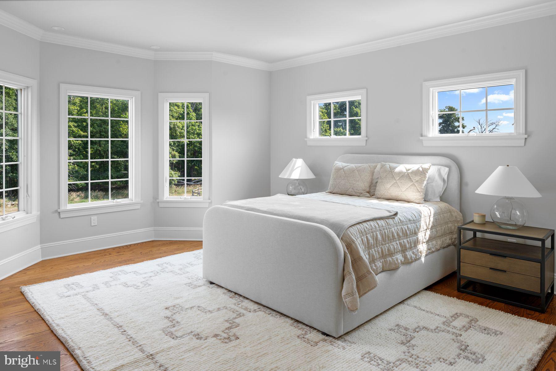 50 Dunkard Church Road Stockton, NJ 08559 - Photo 34 of 51 a spacious bedroom with a bed and a window
