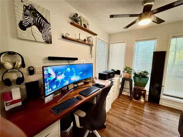 a room with furniture and flat screen tv