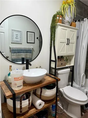 a view of a patio with table and chairs and couches