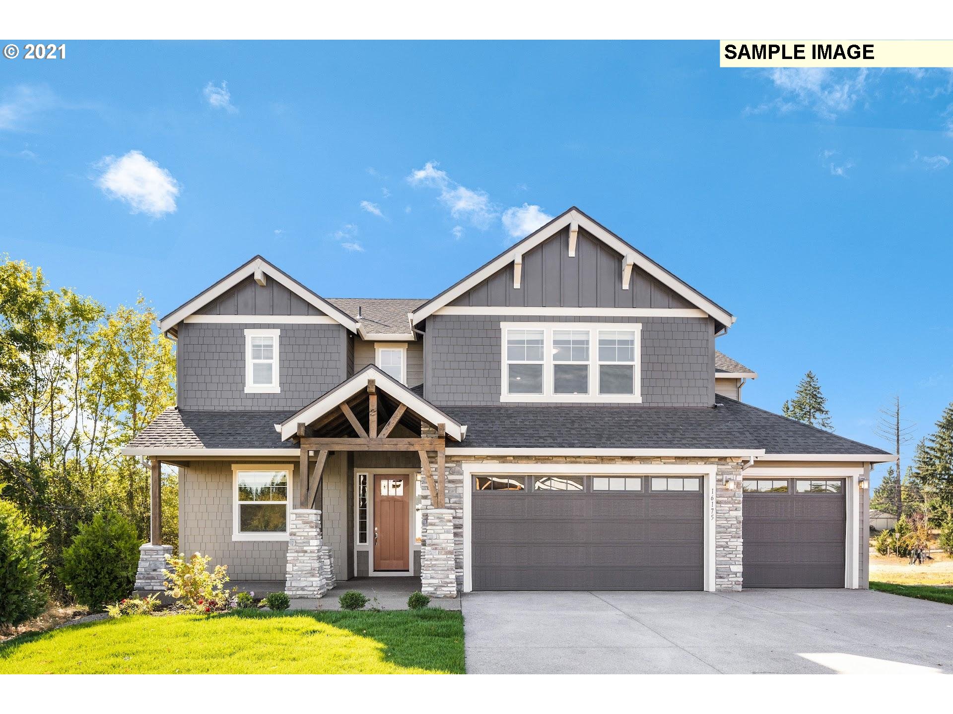 1715 Northeast Hancock Road Camas, WA 98607 - Photo 13 of 14 a front view of a house with a yard