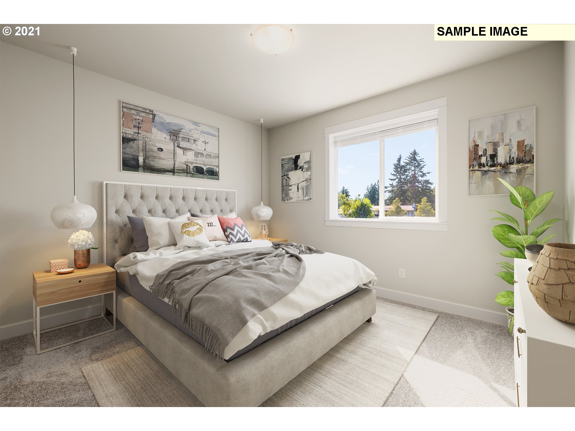 1715 Northeast Hancock Road Camas, WA 98607 - Photo 5 of 14 a bedroom with a bed painting on wall and a potted plant