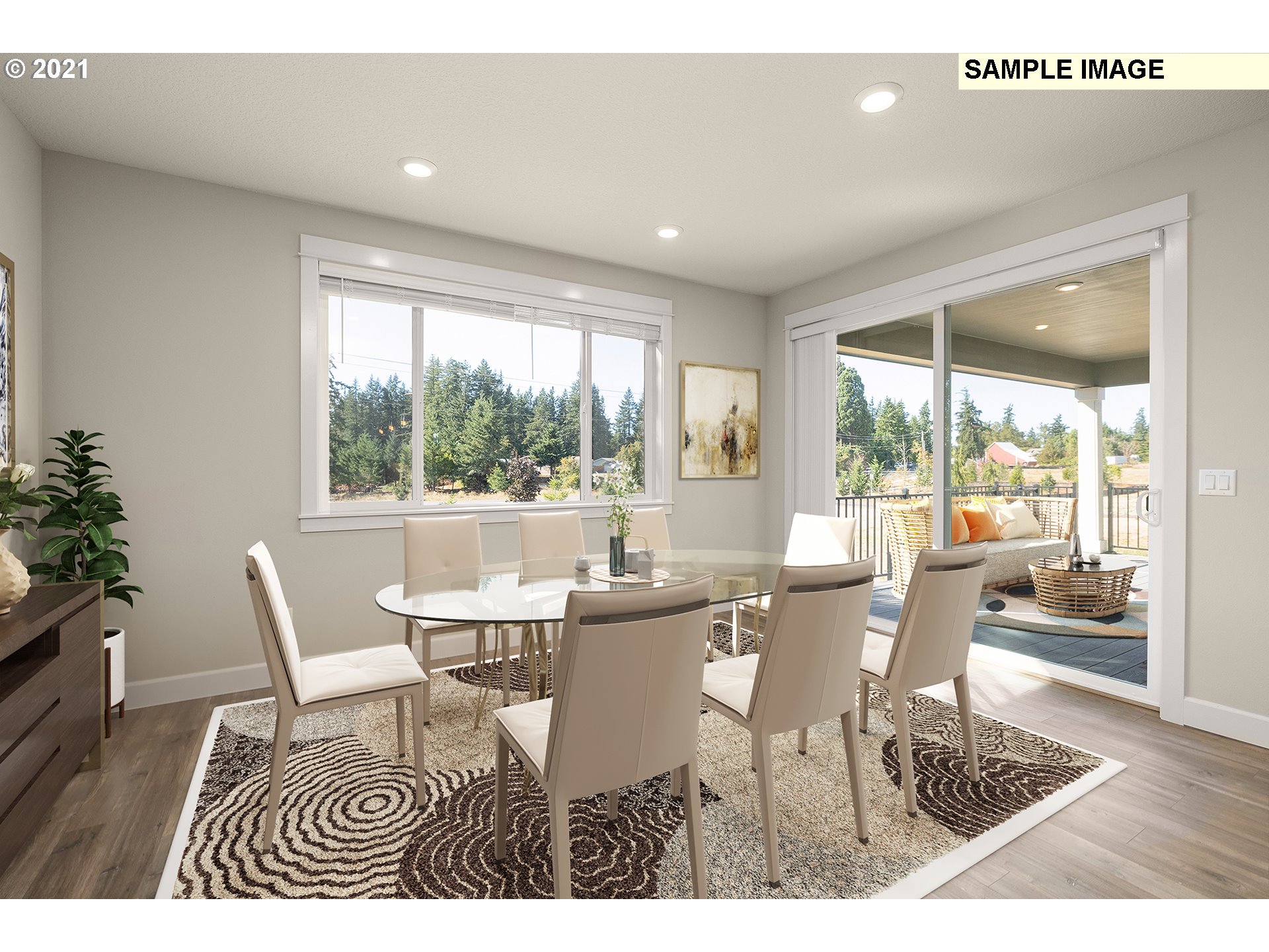 1715 Northeast Hancock Road Camas, WA 98607 - Photo 6 of 14 a dining room with furniture wooden floor and a potted plant