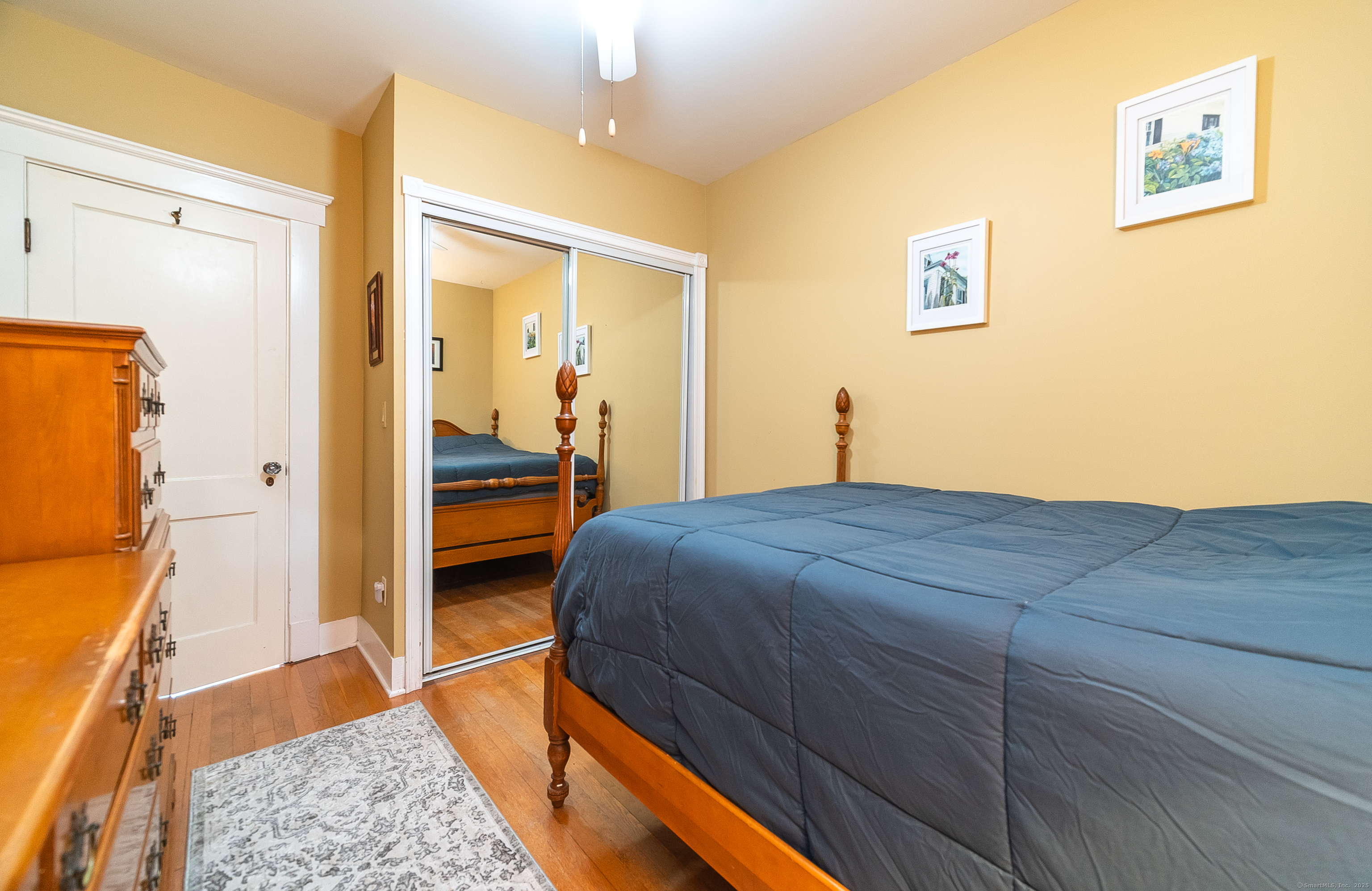 18 Ingram Street Hamden, CT 06517 - Photo 31 of 39 a bedroom with a bed and a dresser