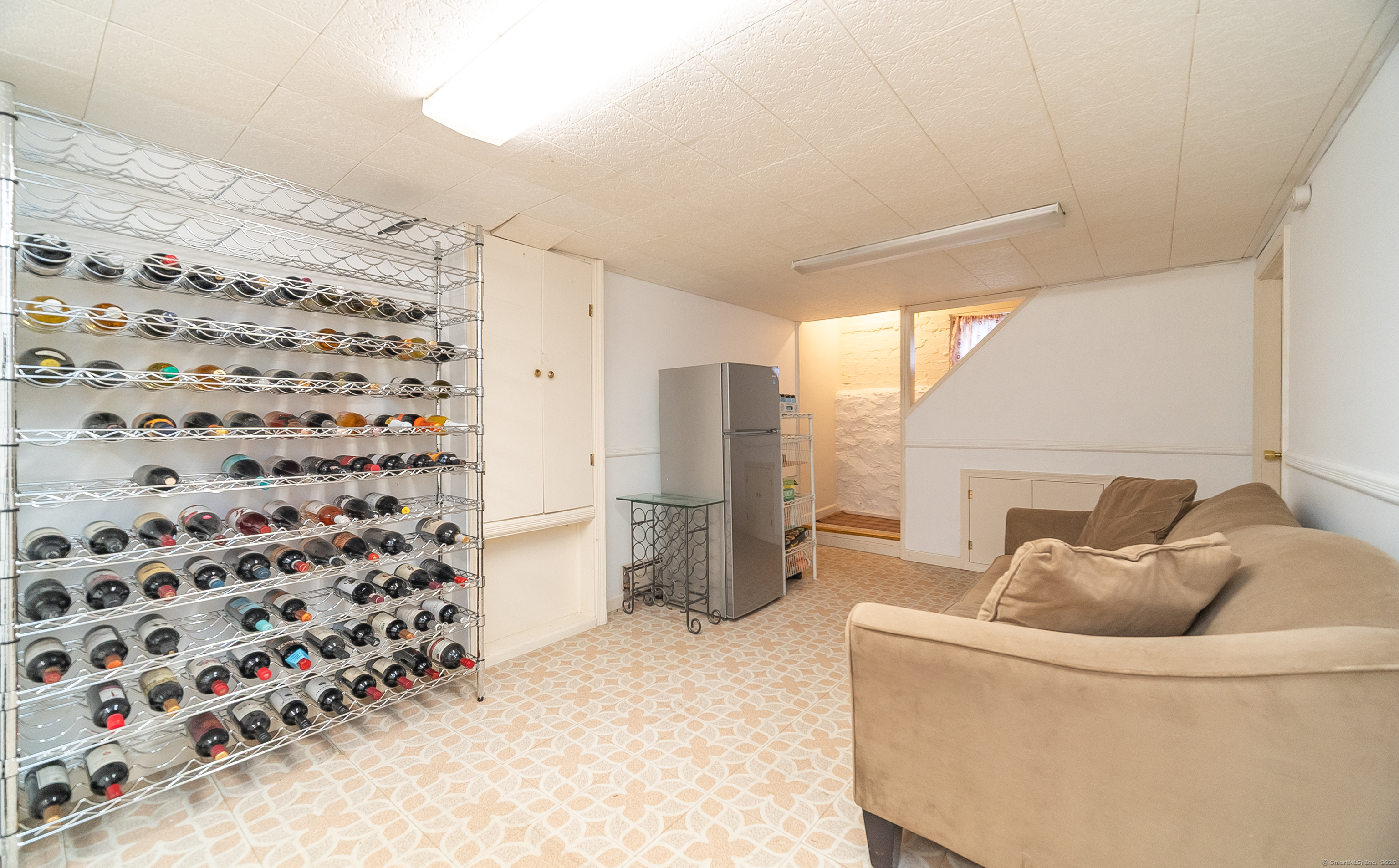 18 Ingram Street Hamden, CT 06517 - Photo 35 of 39 a living room with furniture and a fireplace