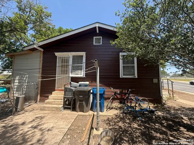 a view of a house with a patio