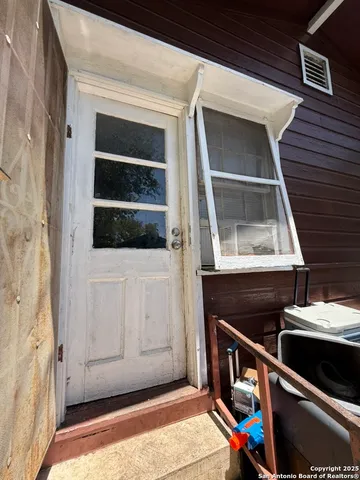 a view of an entryway with sitting space