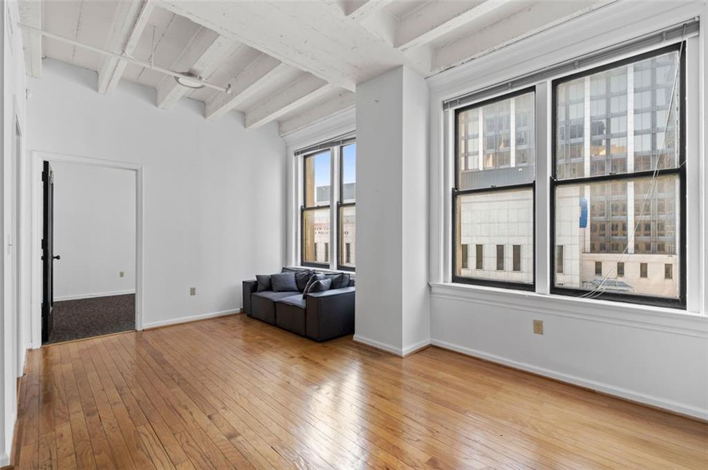 32 Peachtree Street Northwest, Unit 804 Atlanta, GA 30303 - Photo 14 of 40 a view of an empty room with a window