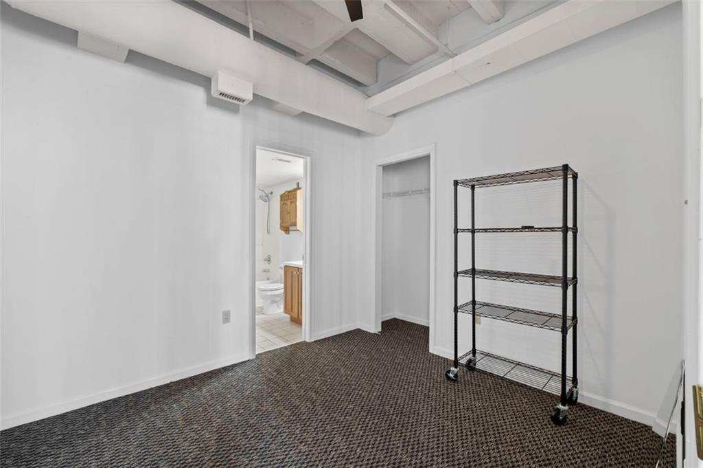 32 Peachtree Street Northwest, Unit 804 Atlanta, GA 30303 - Photo 18 of 40 wooden floor in an empty room
