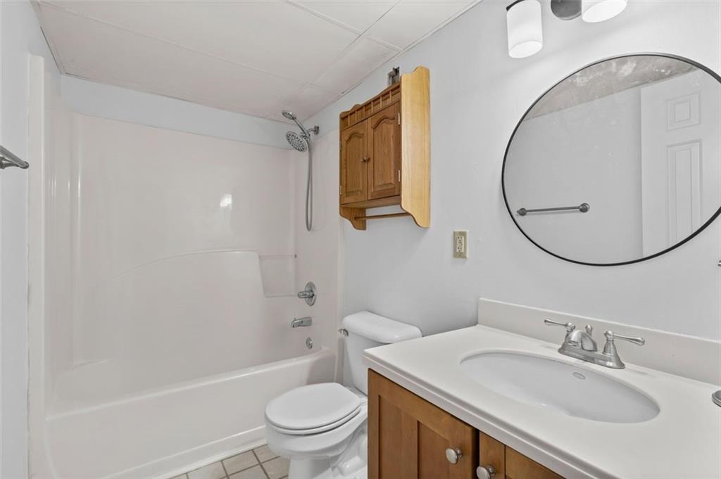 32 Peachtree Street Northwest, Unit 804 Atlanta, GA 30303 - Photo 20 of 40 a bathroom with a sink and a mirror