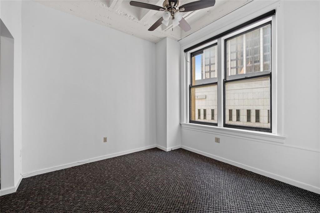 32 Peachtree Street Northwest, Unit 804 Atlanta, GA 30303 - Photo 21 of 40 an empty room with a window