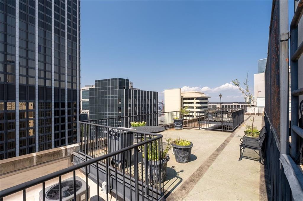32 Peachtree Street Northwest, Unit 804 Atlanta, GA 30303 - Photo 28 of 40 a view of balcony with a potted plant