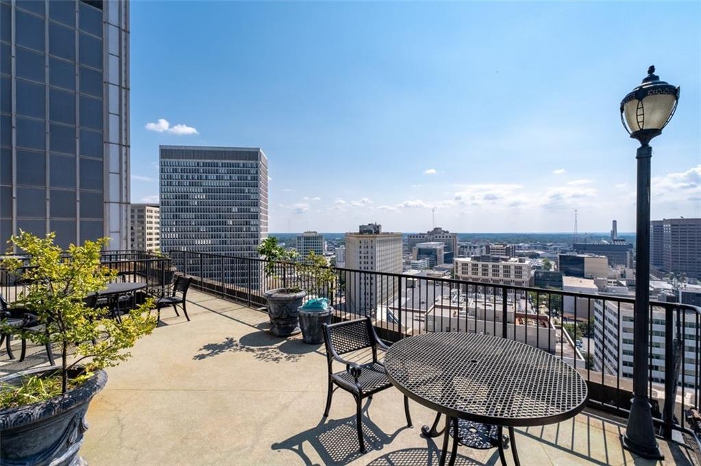 32 Peachtree Street Northwest, Unit 804 Atlanta, GA 30303 - Photo 29 of 40 a view of a chairs and table in the terrace