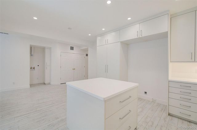 a bathroom with a sink a double vanity and a mirror