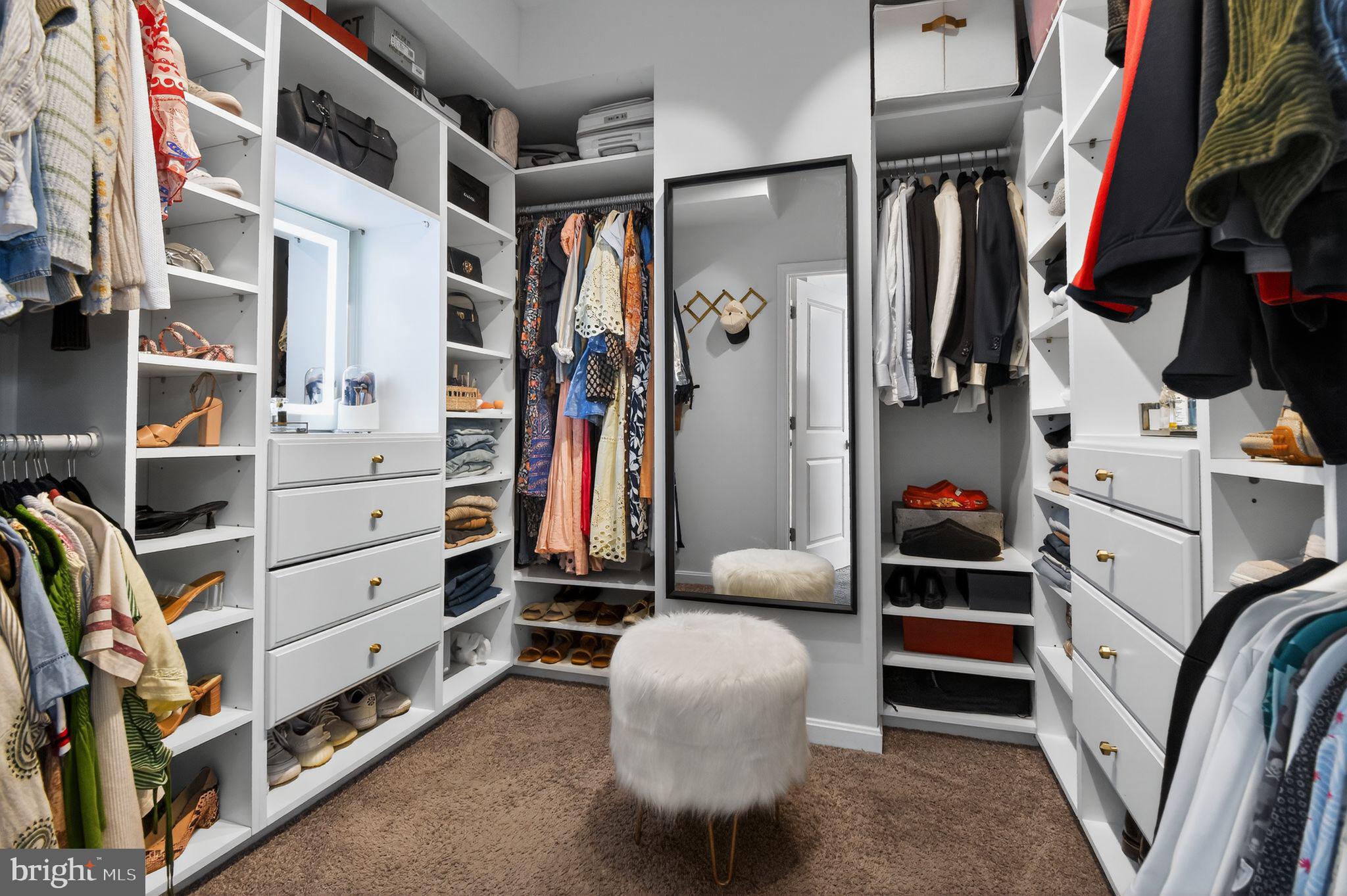 322 Bright Light Court Edgewater, MD 21037 - Photo 28 of 36 Primary walk in closet. Lighted mirror conveys.