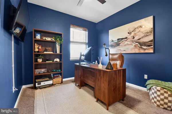 a room with furniture and window