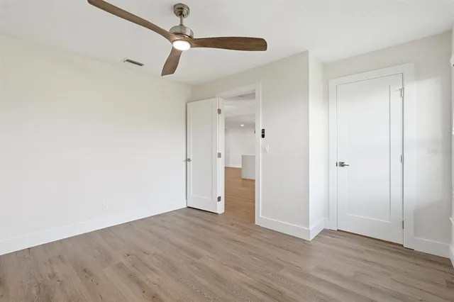 a bathroom with a shower and toilet