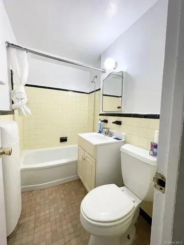 a view of a hallway with a chandelier
