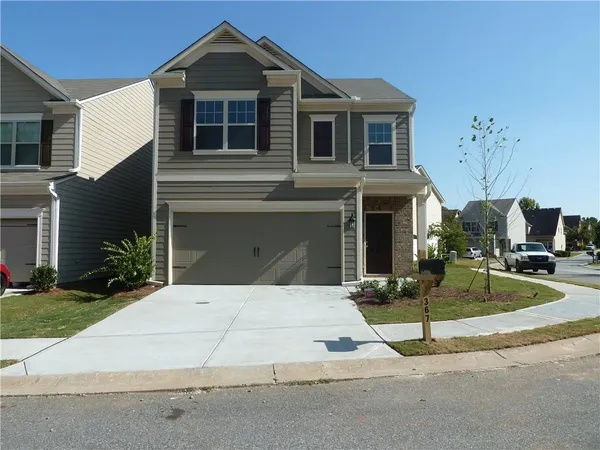 a front view of a house with entertaining space
