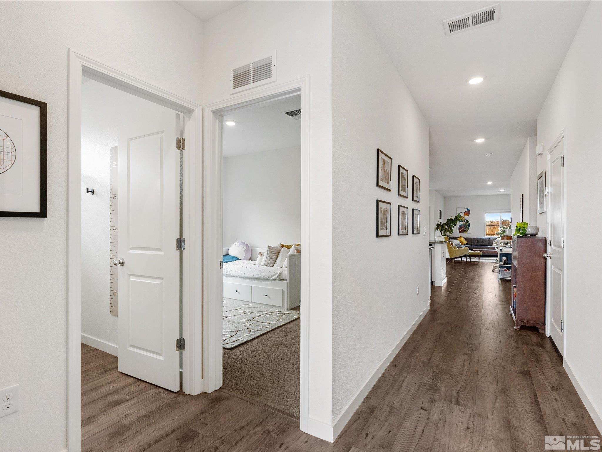 1173 Alder Drive Fallon, NV 89406 - Photo 25 of 40 a view of a hallway with wooden floor windows and a living room