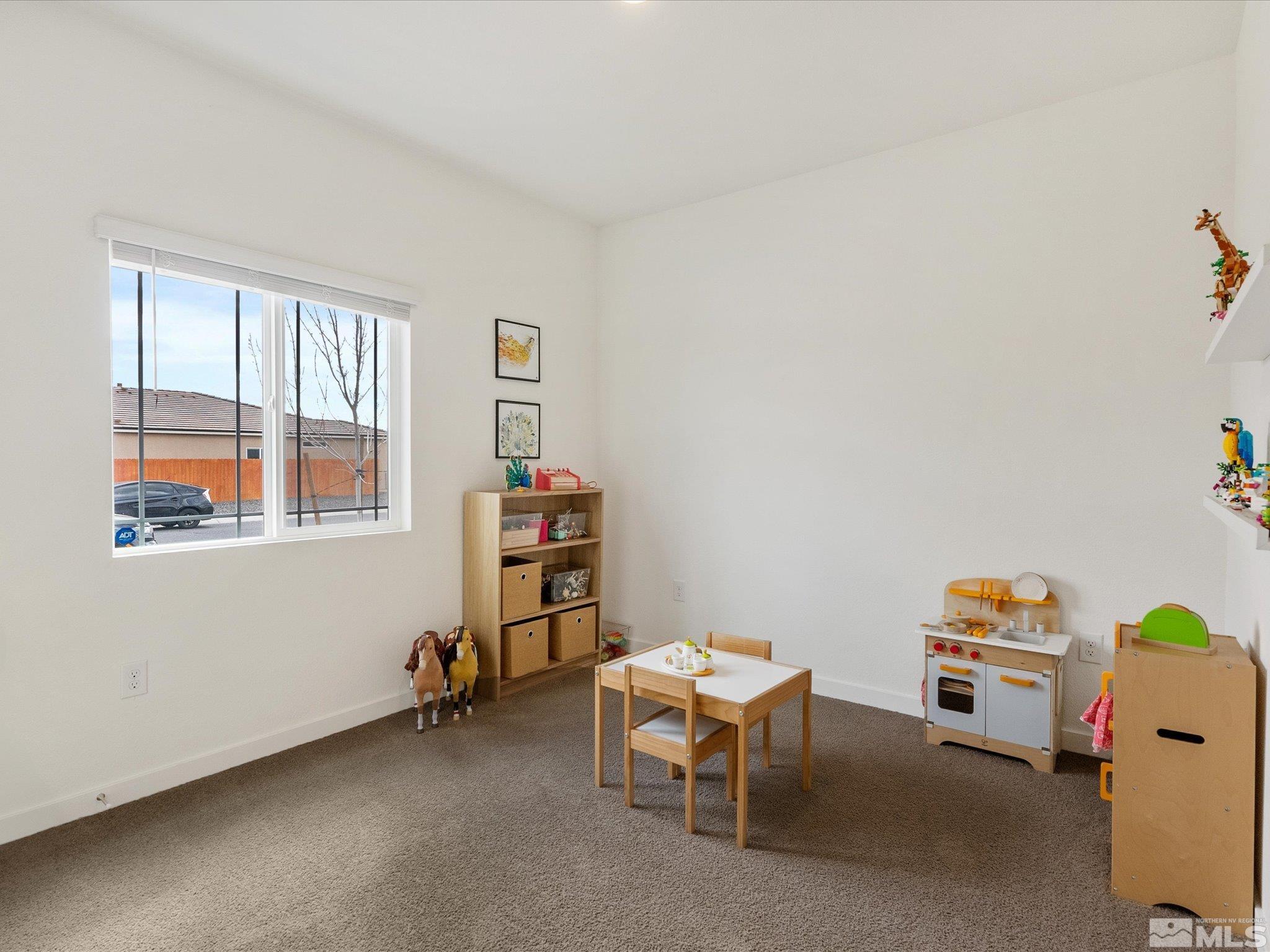 1173 Alder Drive Fallon, NV 89406 - Photo 27 of 40 a view of room with baby crib and furniture
