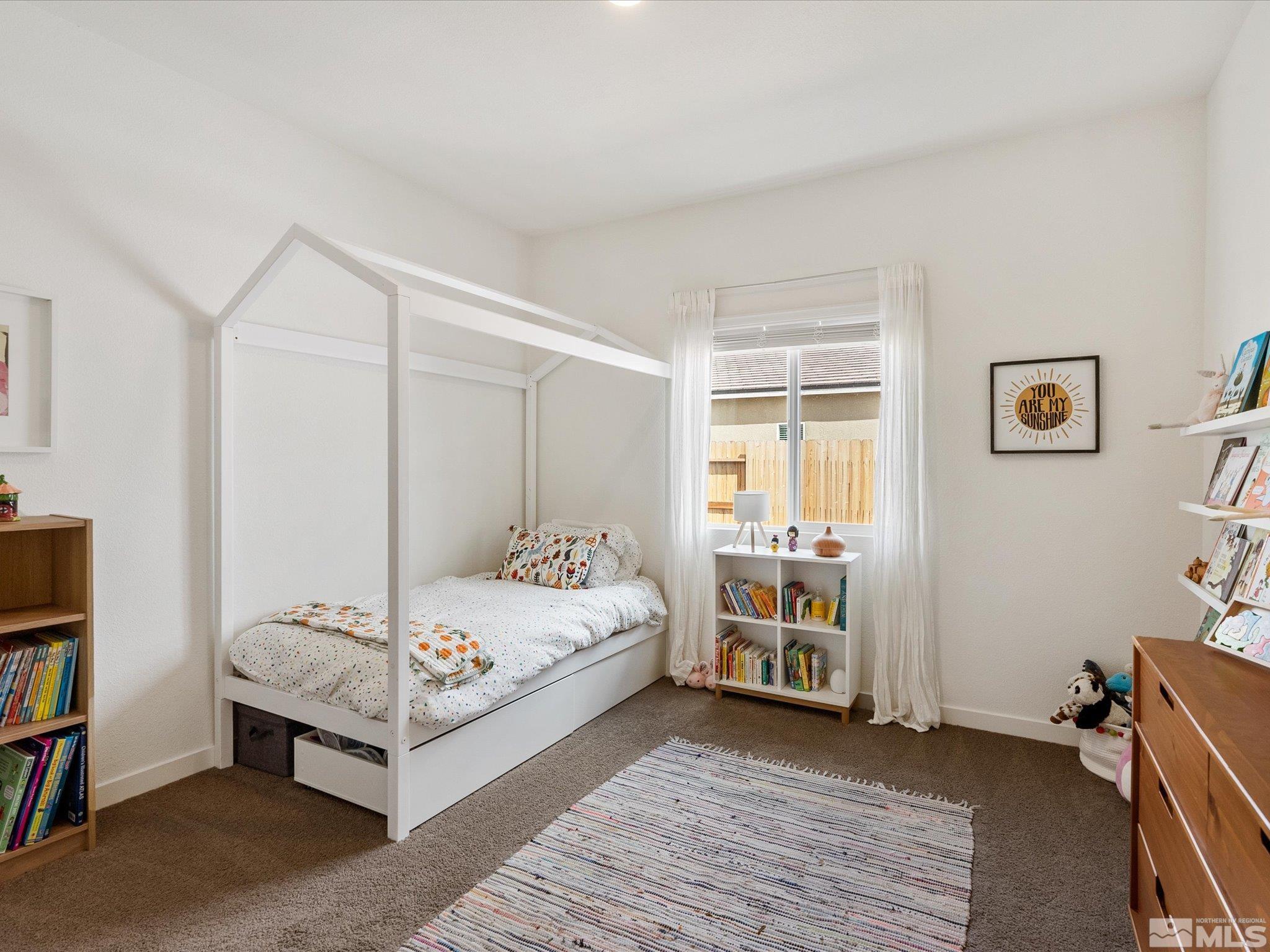 1173 Alder Drive Fallon, NV 89406 - Photo 28 of 40 a bedroom with a bed and a window