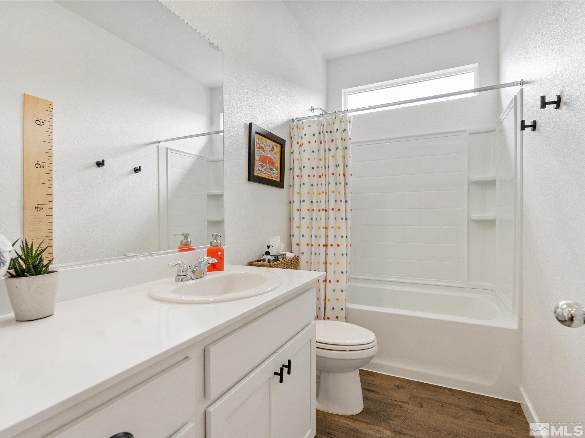 1173 Alder Drive Fallon, NV 89406 - Photo 29 of 40 a bathroom with a sink toilet and shower