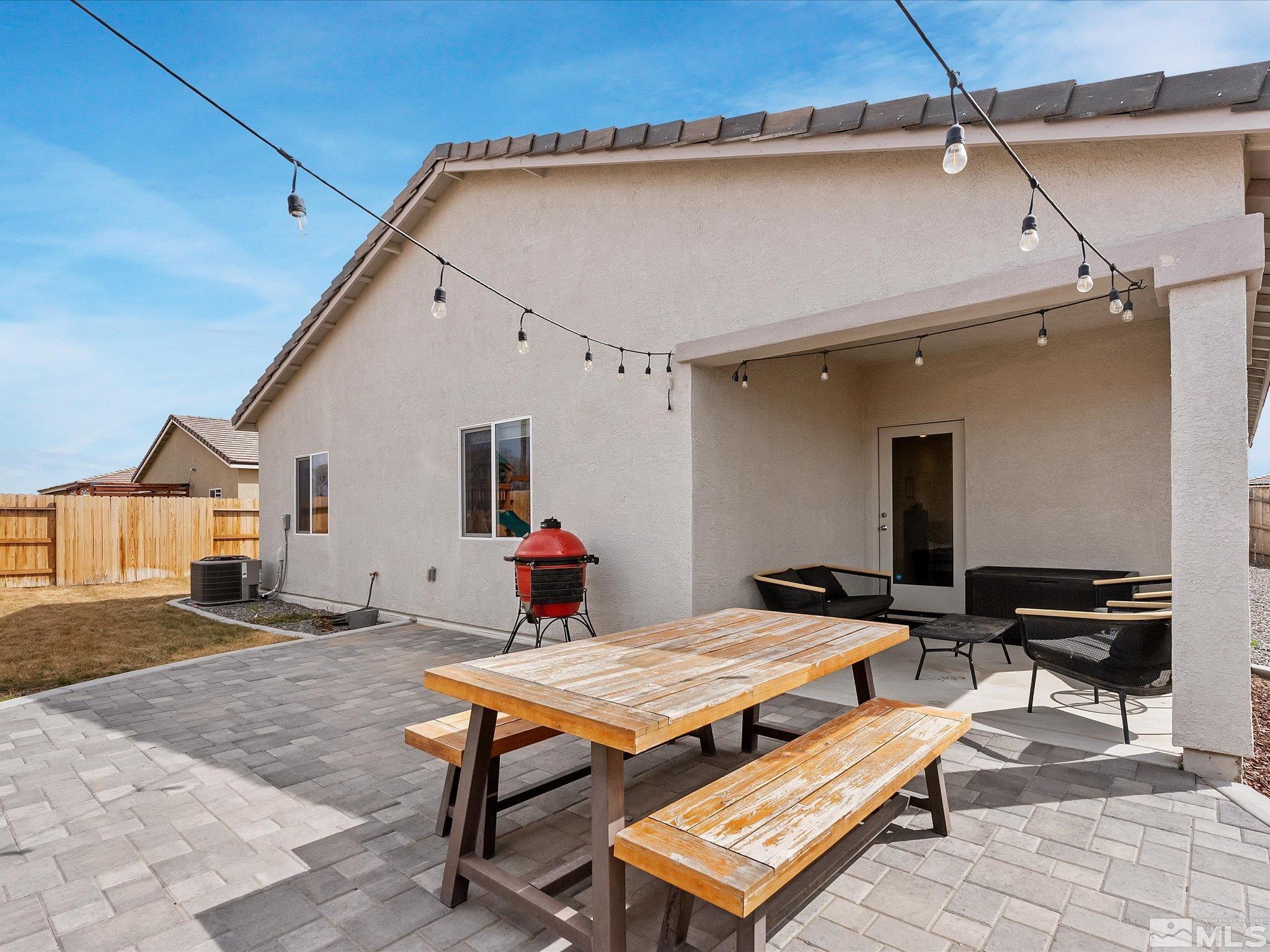 1173 Alder Drive Fallon, NV 89406 - Photo 32 of 40 a bedroom with a bed and a table