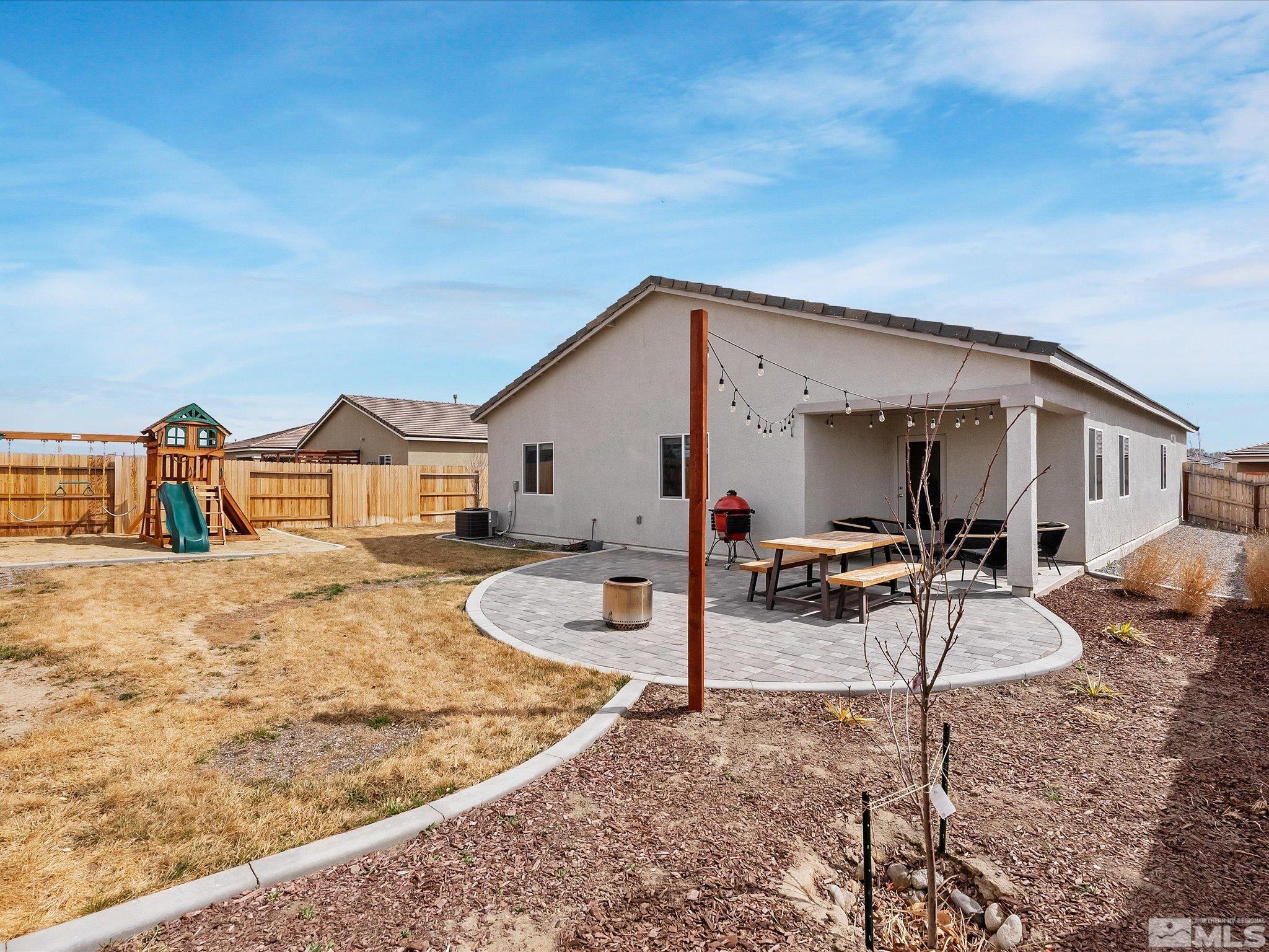 1173 Alder Drive Fallon, NV 89406 - Photo 33 of 40 a view of a house with backyard and furniture