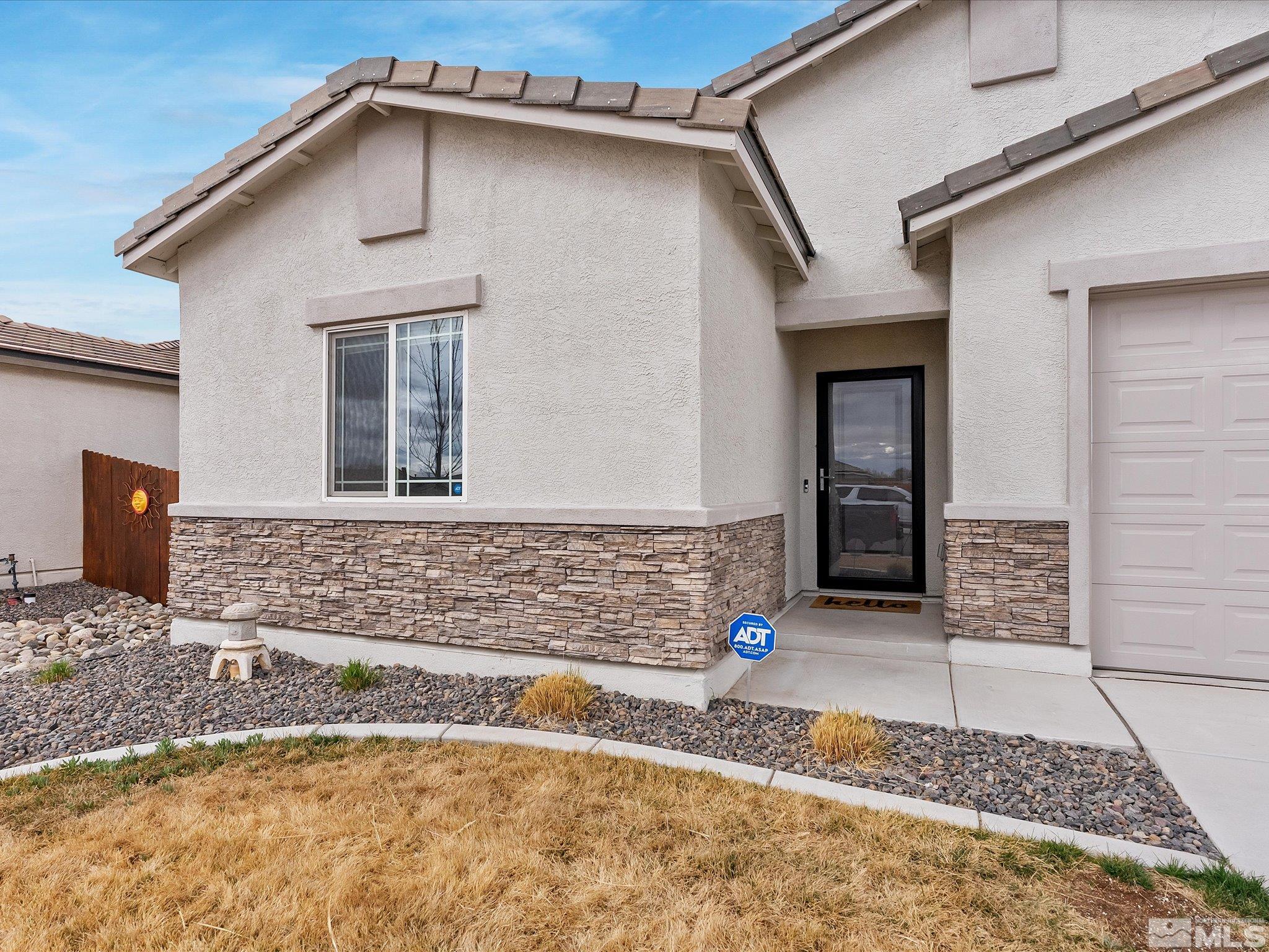 1173 Alder Drive Fallon, NV 89406 - Photo 4 of 40 a front view of a house