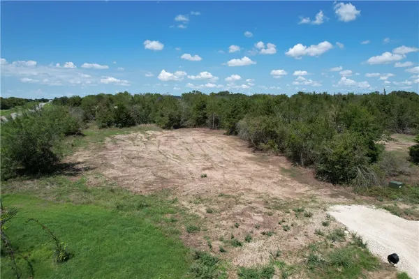 a view of a yard with an outdoor space