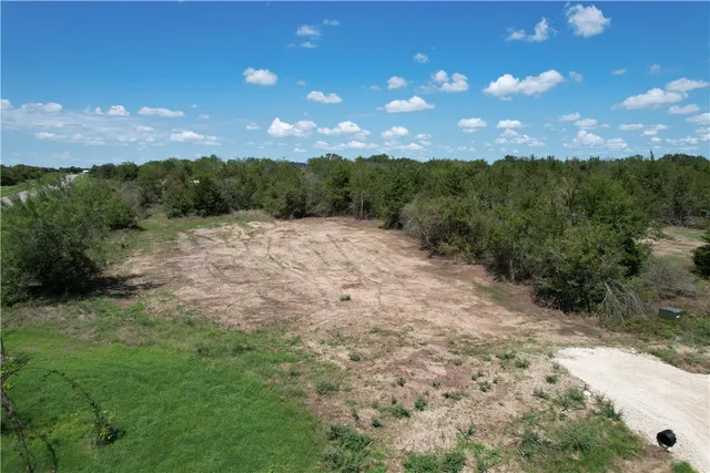 a view of a yard with an outdoor space