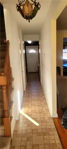 a view of entryway with a front door