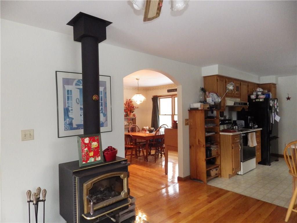 492 Belgrade Road Oakland, ME 04963 - Photo 11 of 32 Enjoy the wood stove in the living room.