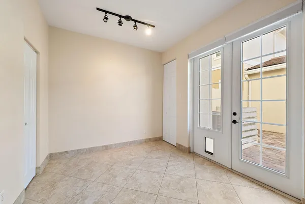 a view of an empty room with a window