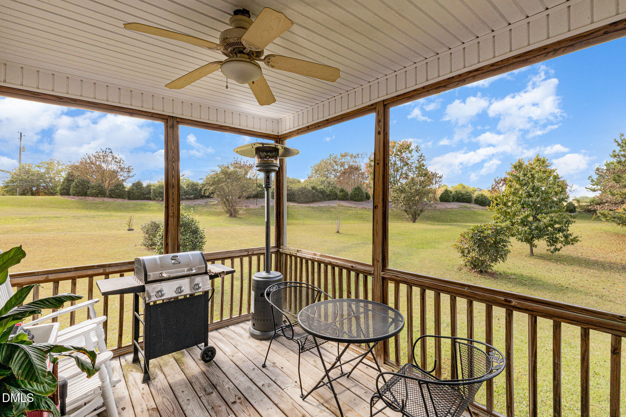 7300 Singlepond Lane Willow Spring, NC 27592 - Photo 23 of 34 a view of a balcony with lake view and a ocean view