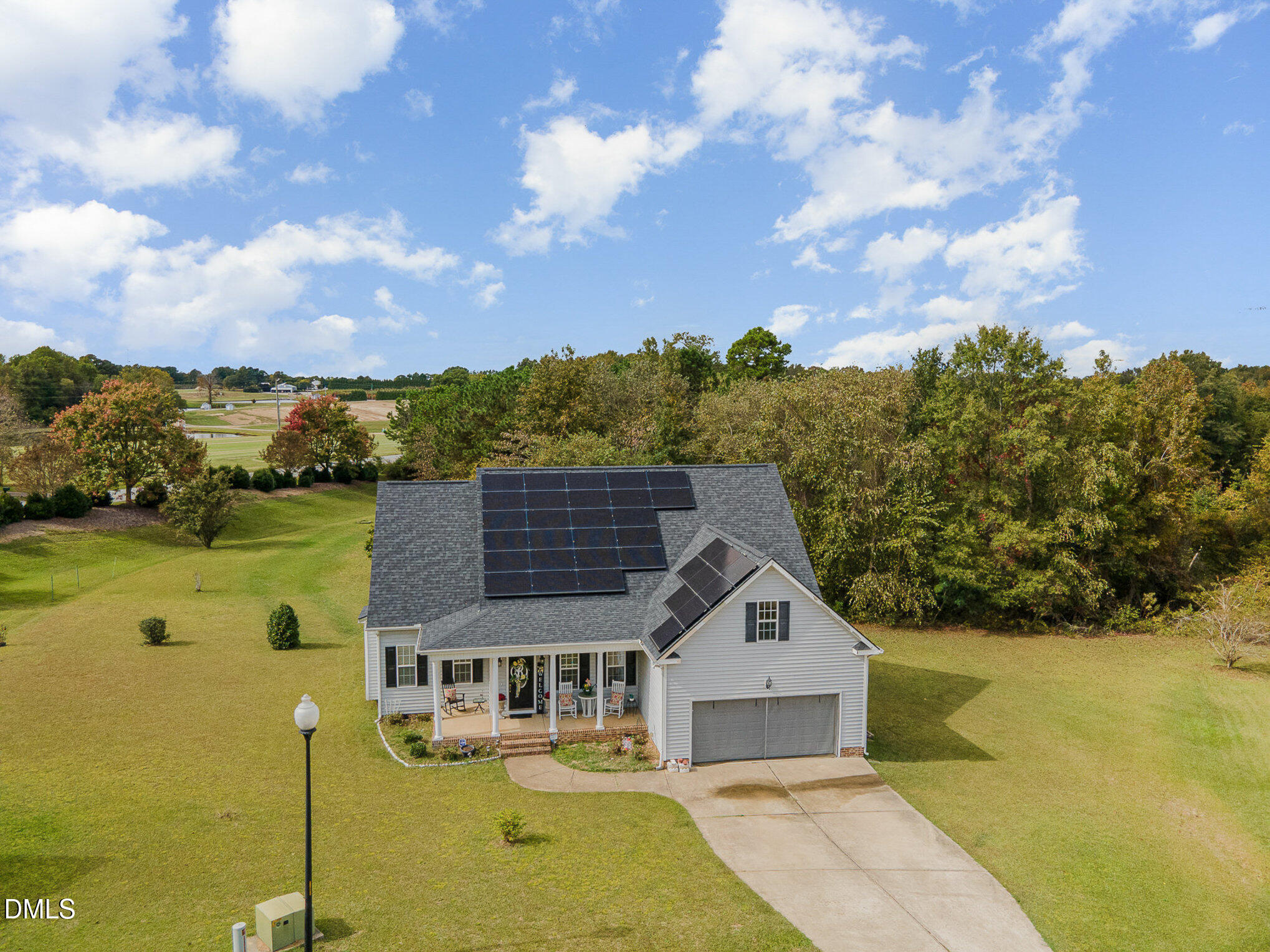 7300 Singlepond Lane Willow Spring, NC 27592 - Photo 29 of 34 a front view of a house with a yard
