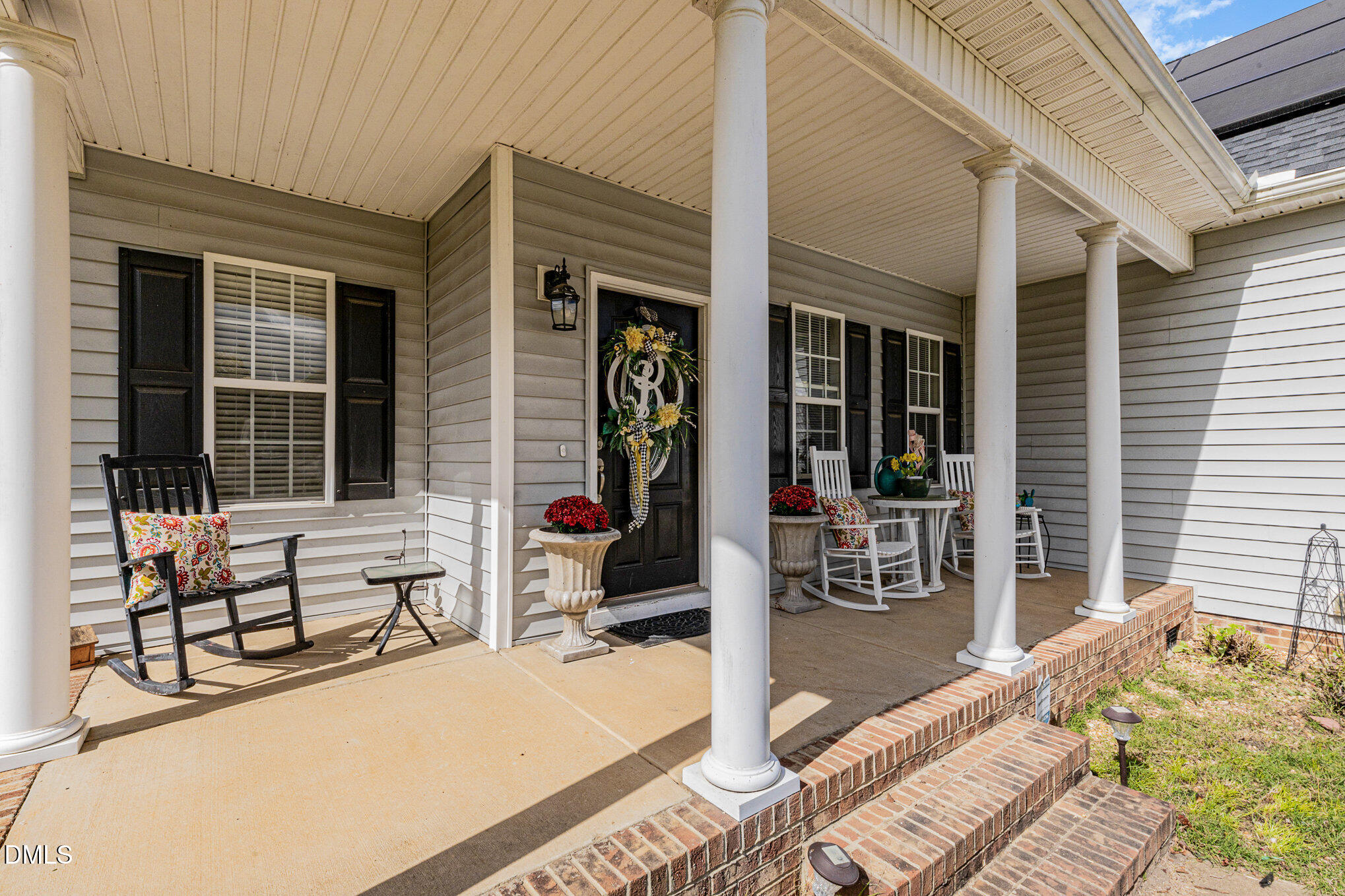 7300 Singlepond Lane Willow Spring, NC 27592 - Photo 5 of 34 a house view with a outdoor seating