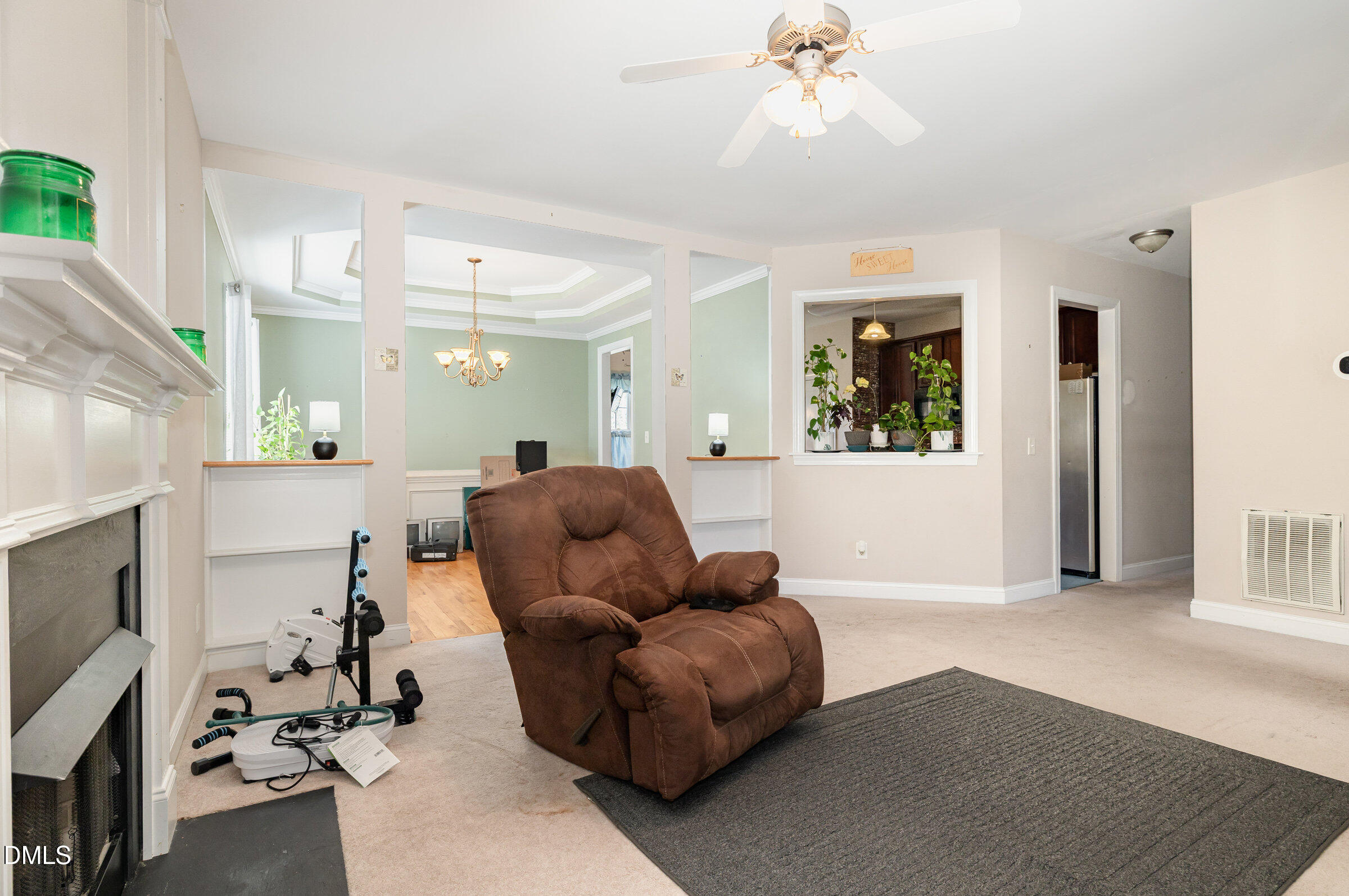 7300 Singlepond Lane Willow Spring, NC 27592 - Photo 6 of 34 a living room with furniture and a fireplace