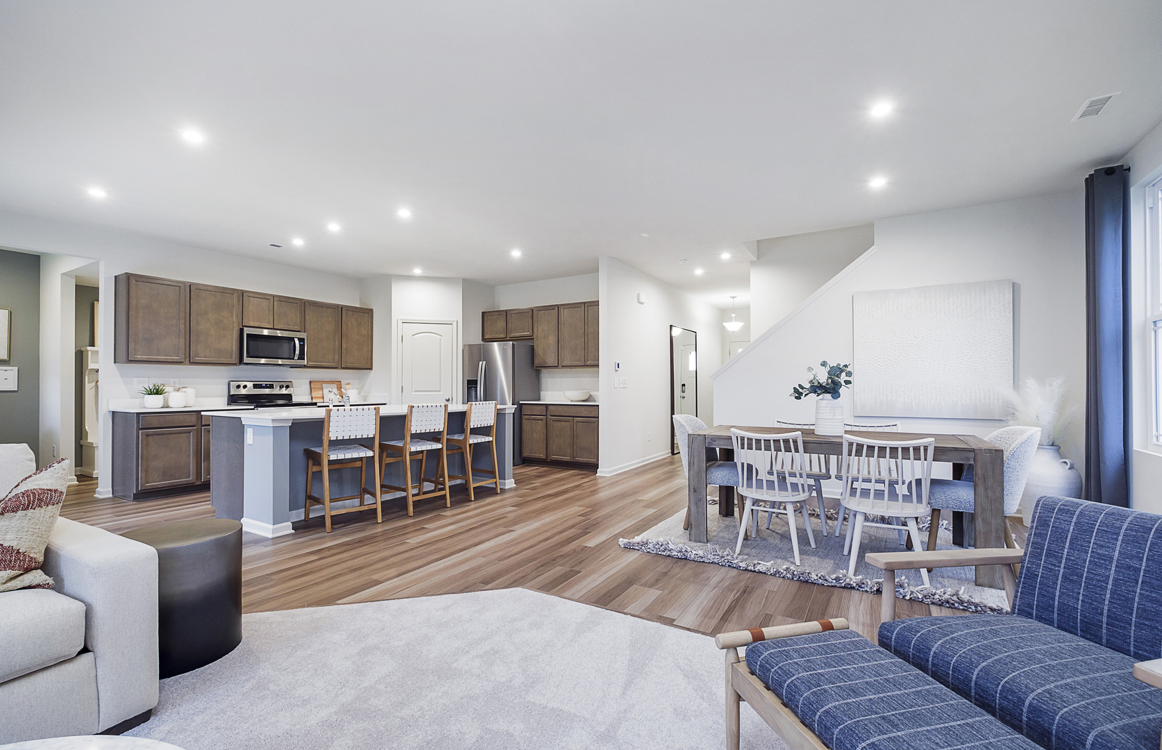 966 Houston Street Batavia, IL 60510 - Photo 8 of 20 a living room with furniture kitchen view and a wooden floor