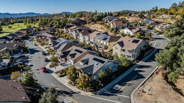 an aerial view of a city with lots of residential buildings