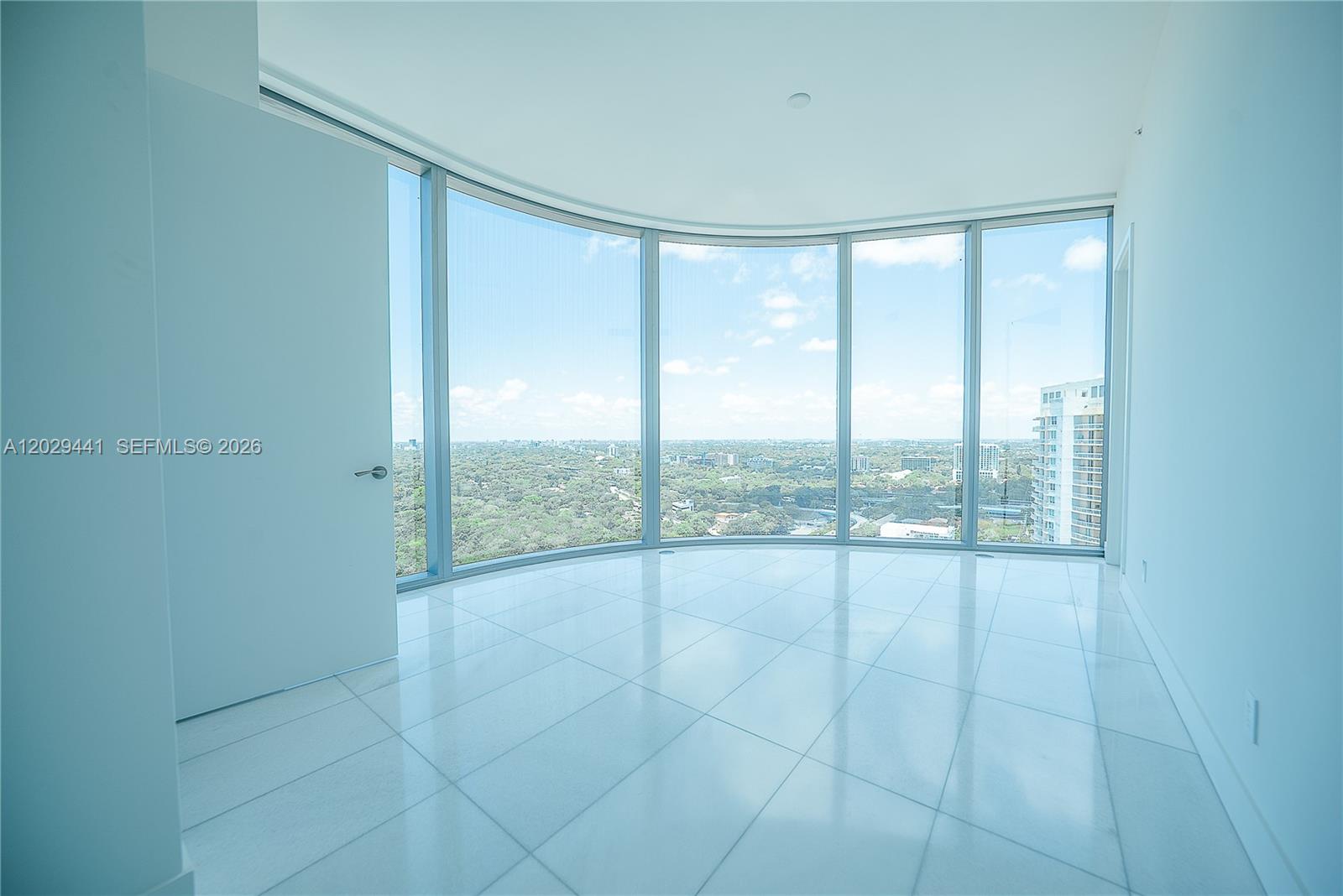 175 Southeast 25th Road, Unit 2103 Miami, FL 33129 - Photo 15 of 27 a view of an empty room and window