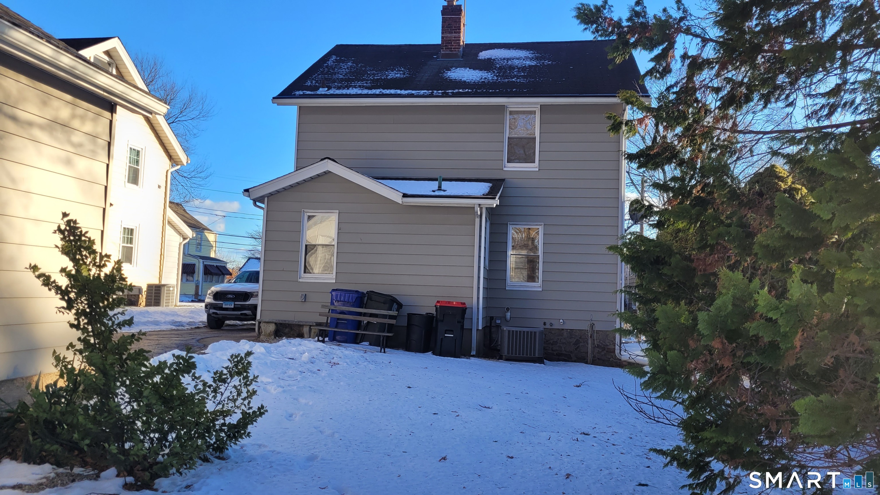 10 Olmstead Place Norwalk, CT 06855 - Photo 2 of 18 a front view of a house with a yard