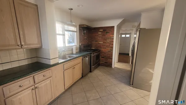 a large kitchen with cabinets