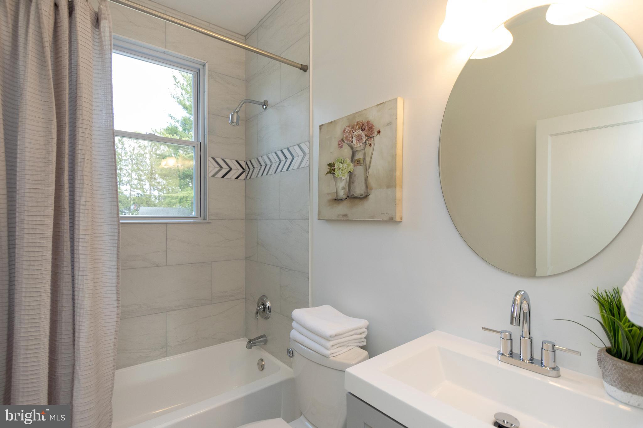 6503 Sherwood Road Baltimore, MD 21239 - Photo 13 of 19 Newly Renovated Full Bath on Main Level