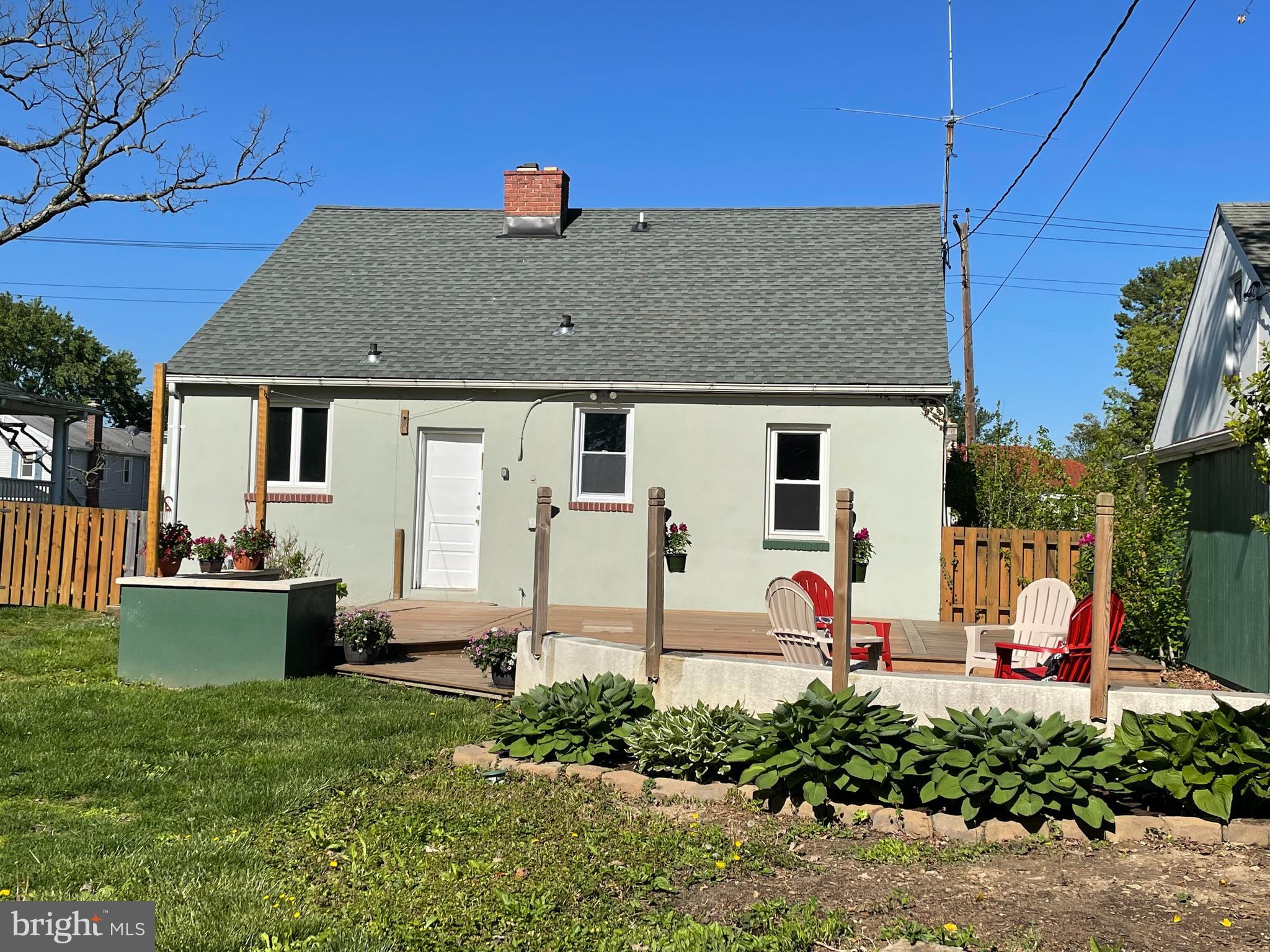 6503 Sherwood Road Baltimore, MD 21239 - Photo 18 of 19 Fabulous tiered rear deck for entertaining.