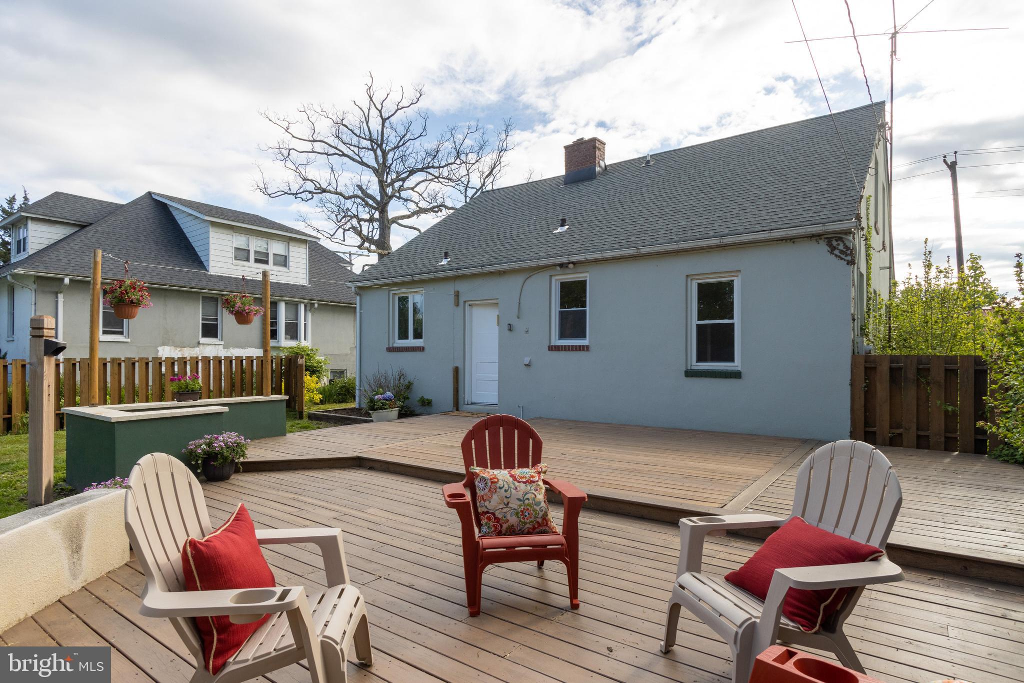 6503 Sherwood Road Baltimore, MD 21239 - Photo 2 of 19 Tiered rear deck for entertaining