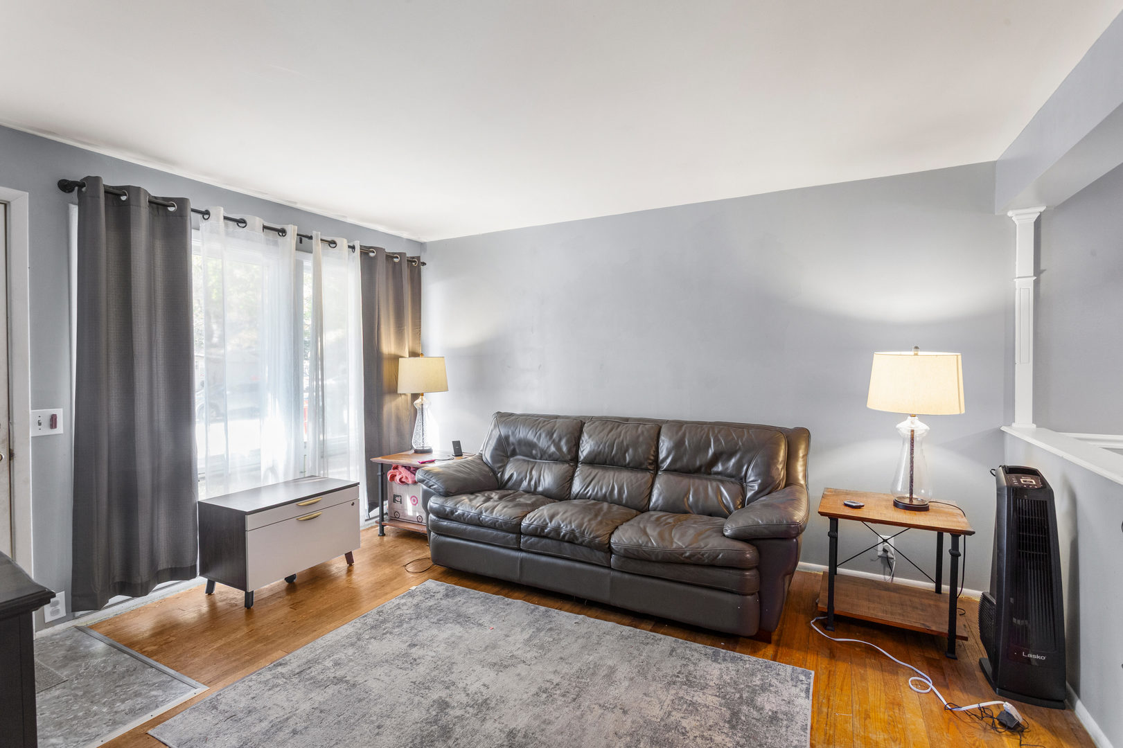 1420 South Western Avenue Champaign, IL 61821 - Photo 13 of 31 a living room with furniture and a window