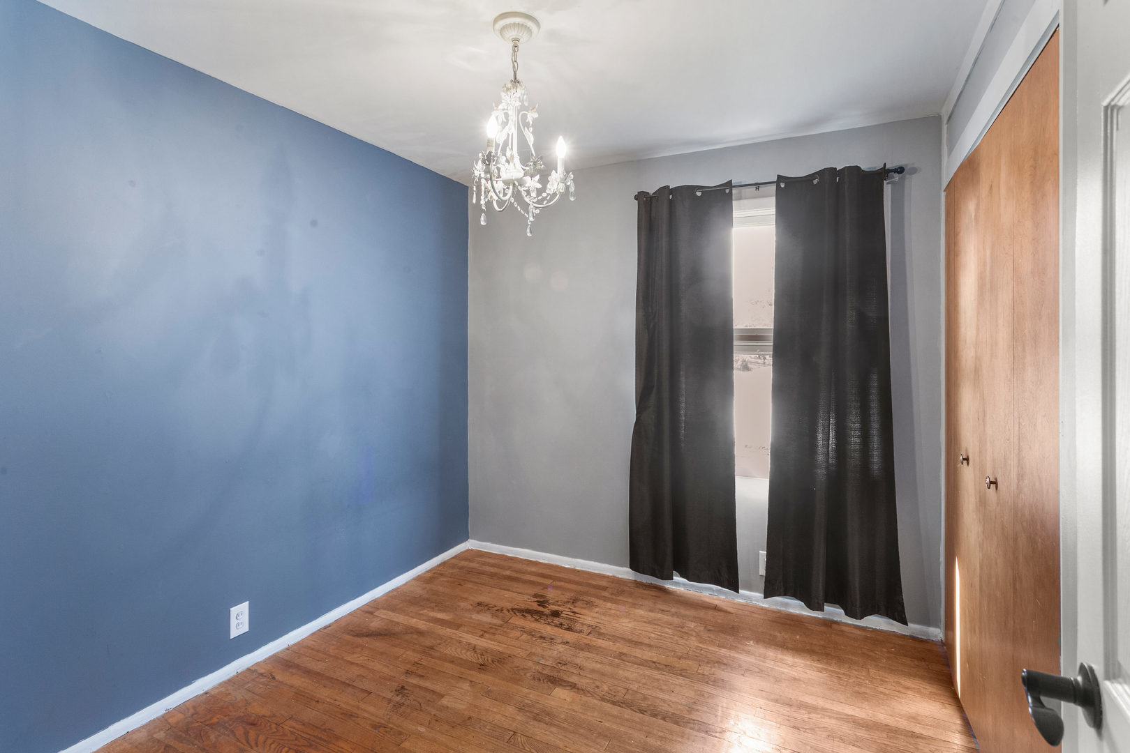 1420 South Western Avenue Champaign, IL 61821 - Photo 22 of 31 a view of a chandelier in an empty room