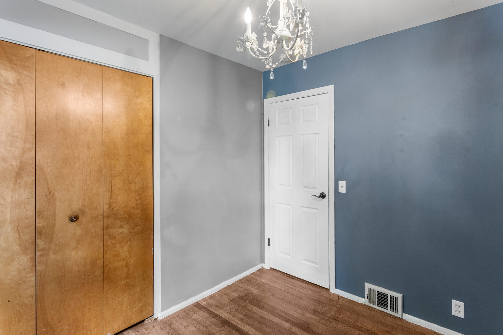 1420 South Western Avenue Champaign, IL 61821 - Photo 23 of 31 a view of a hallway with wooden floor and a door