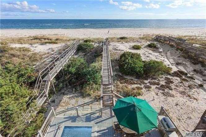 929 Dune Road West Hampton Dunes, NY 11978 - Photo 2 of 10 a view of an ocean and beach